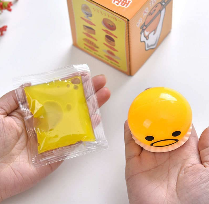 Cute Yellow Round Sucking & Vomiting Lazy Egg Yolk Vent Stress Tricky Game Relief JDS Toy